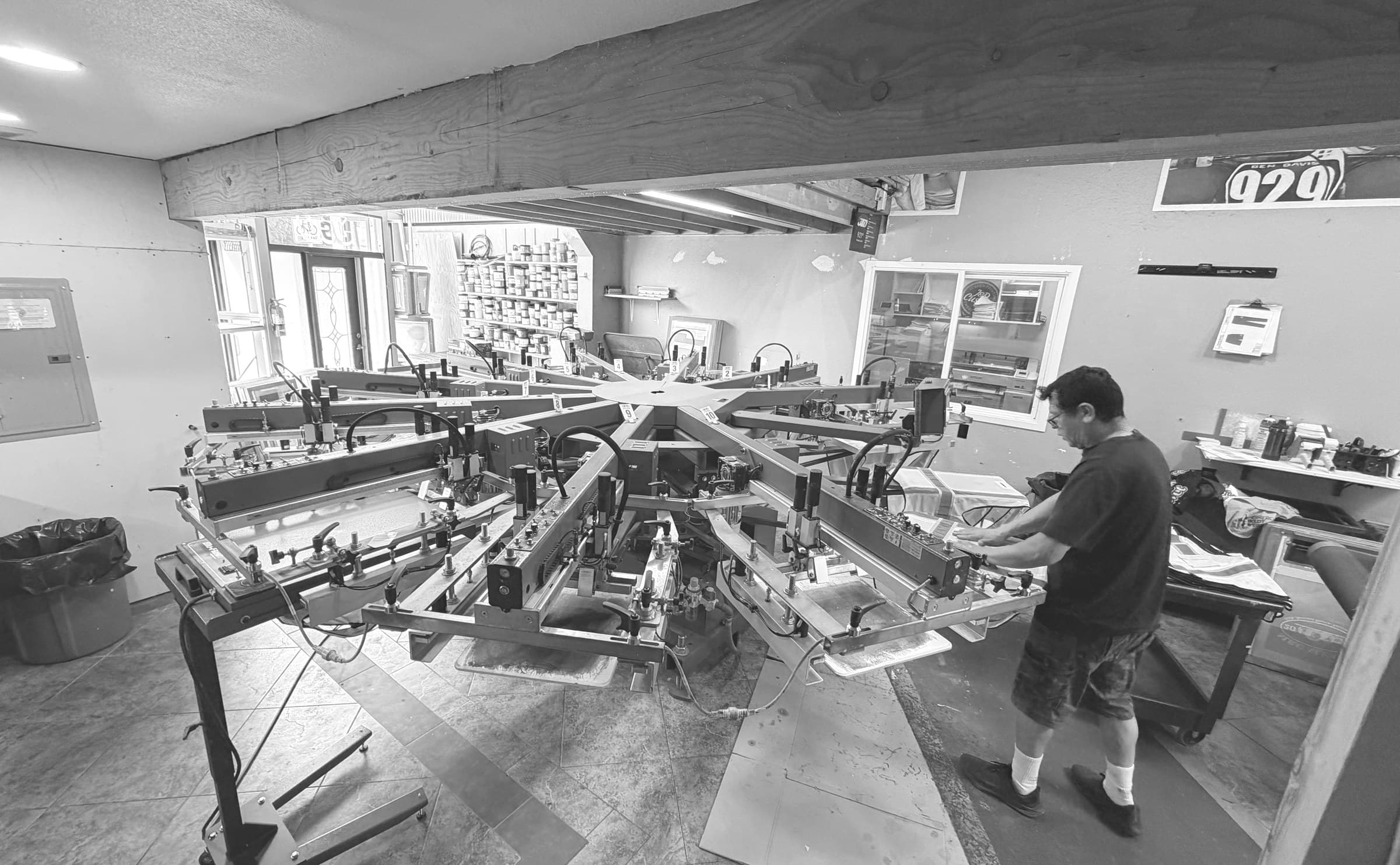 J&D Custom Embroidery screen printing shop floor — 10-color automatic press in Martinez, CA
