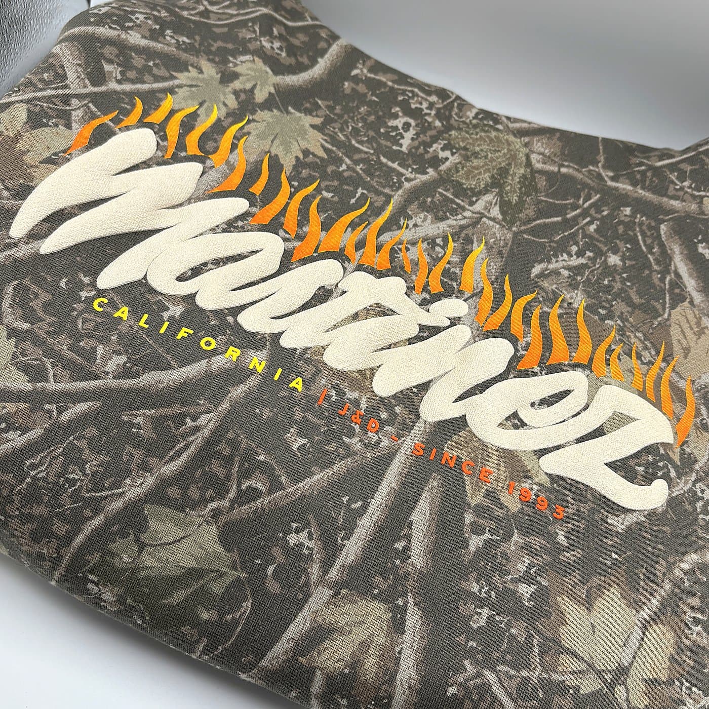 Martinez California print detail on Realtree camo